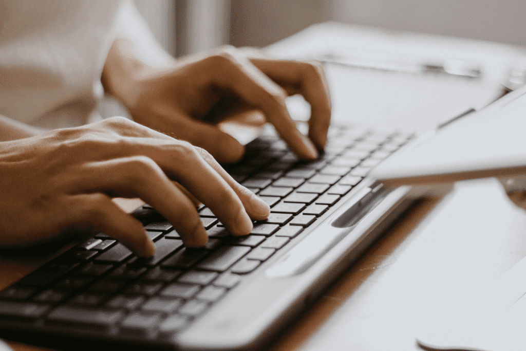 a person using a keyboard for a purpose